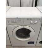 AN INDESIT WIXL143 WASHING MACHINE IN CLEAN AND WORKING ORDER (KEPT AS SPARE SO LITTLE USE)