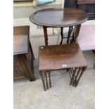 AN OAK NEST OF TABLES ON BARLEY TWIST SUPPORTS AND AN OVAL MAHOGANY SIDE TABLE