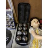 A CASED SET OF PROFFESIONAL BOULES