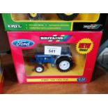 A BOXED BRITAINS DIE CAST FORD 7600 1:32 SCALE TRACTOR MODEL, REF NO. 42416