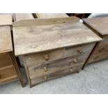 A RUSTIC PINE CHEST OF TWO SHORT AND TWO LONG DRAWERS