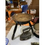 A WOODEN STOOL TOGETHER WITH CAST IRON