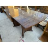 A MAHOGANY DRAW LEAF DINING TABLE