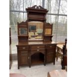 A VICTORIAN MAHOGANY MIRROR BACKED SIDEBOARD WITH TWO DOORS, FOUR DRAWERS AND THREE UPPER BEVEL EDGE