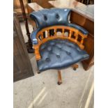 A CHESTERFIELD STYLE MAHOGANY AND BUTTONED LEATHER OFFICE CHAIR