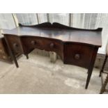 A VICTORIAN MAHOGANY SERPENTINE FRONT SIDEBOARD WITH TWO DOORS AND ONE DRAWER