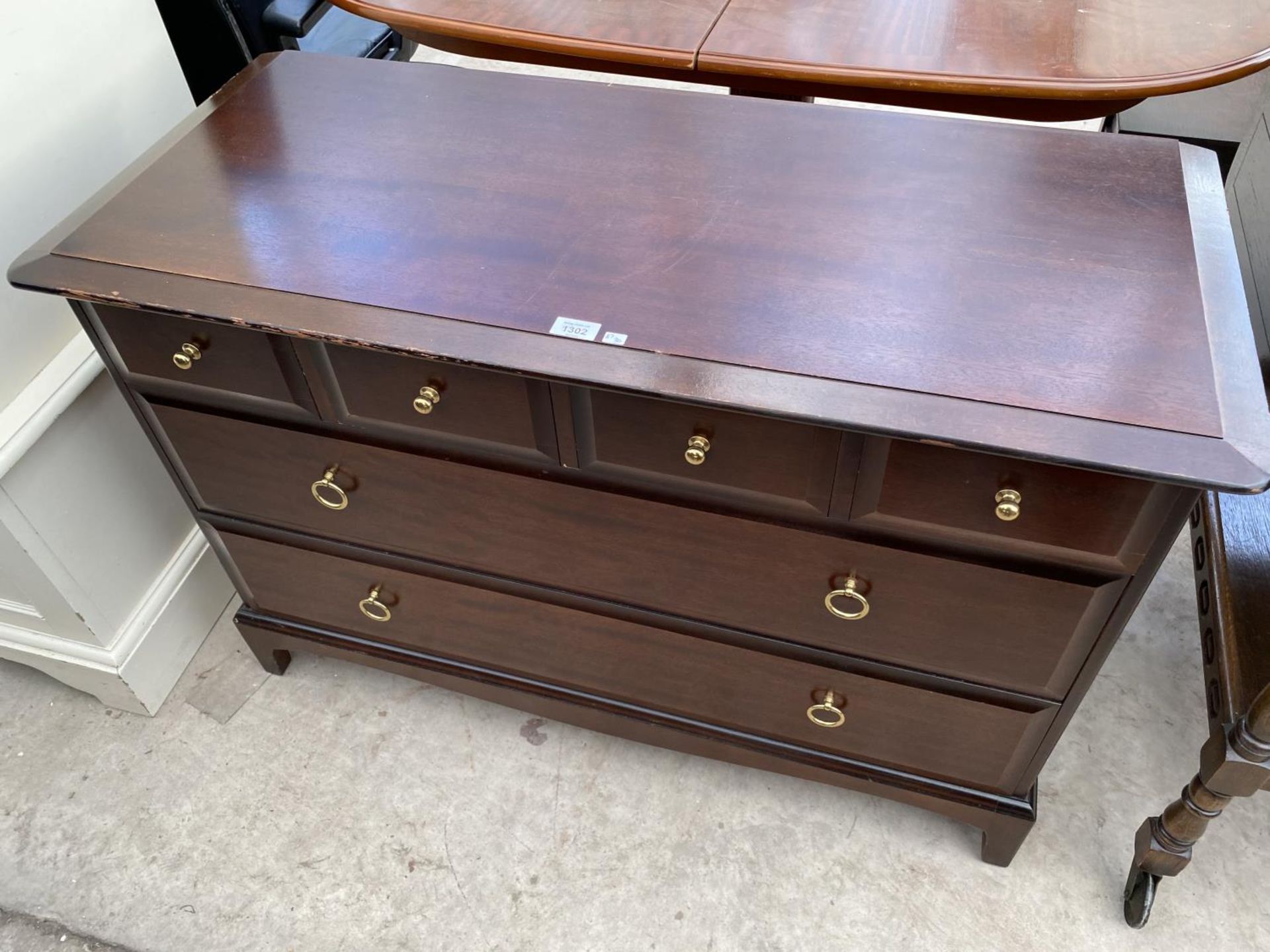 A STAG MINSTREL MAHOGANY CHEST OF FOUR SMALL AND TWO LONG DRAWERS