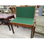 A FOLDING TEAK CARD TABLE