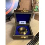 A BOXED BRASS HENRY HUGHES COMPASS