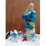 A COLLECTION OF SMURF FIGURES AND WORKING ORDER SMURF LAMP