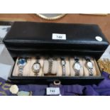 A BLACK LEATHER EFFECT WATCH CASE AND FASHION WATCHES