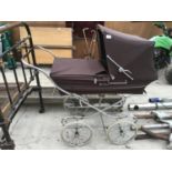 A VINTAGE BROWN 'SILVER CROSS' PRAM AND VARIOUS OTHER BABY ITEMS TO INCLUDE A TRAVEL COT, BABY