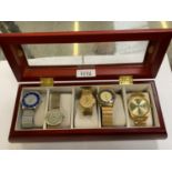 A WATCH CASE CONTAINING FIVE GENTS WRIST WATCHES