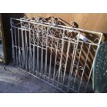 A PAIR OF WHITE PAINTED WROUGHT IRON GATES 114CM X 95CM HIGH