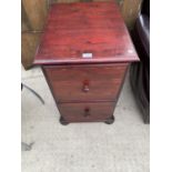 A PINE BEDSIDE CHEST OF TWO DRAWERS