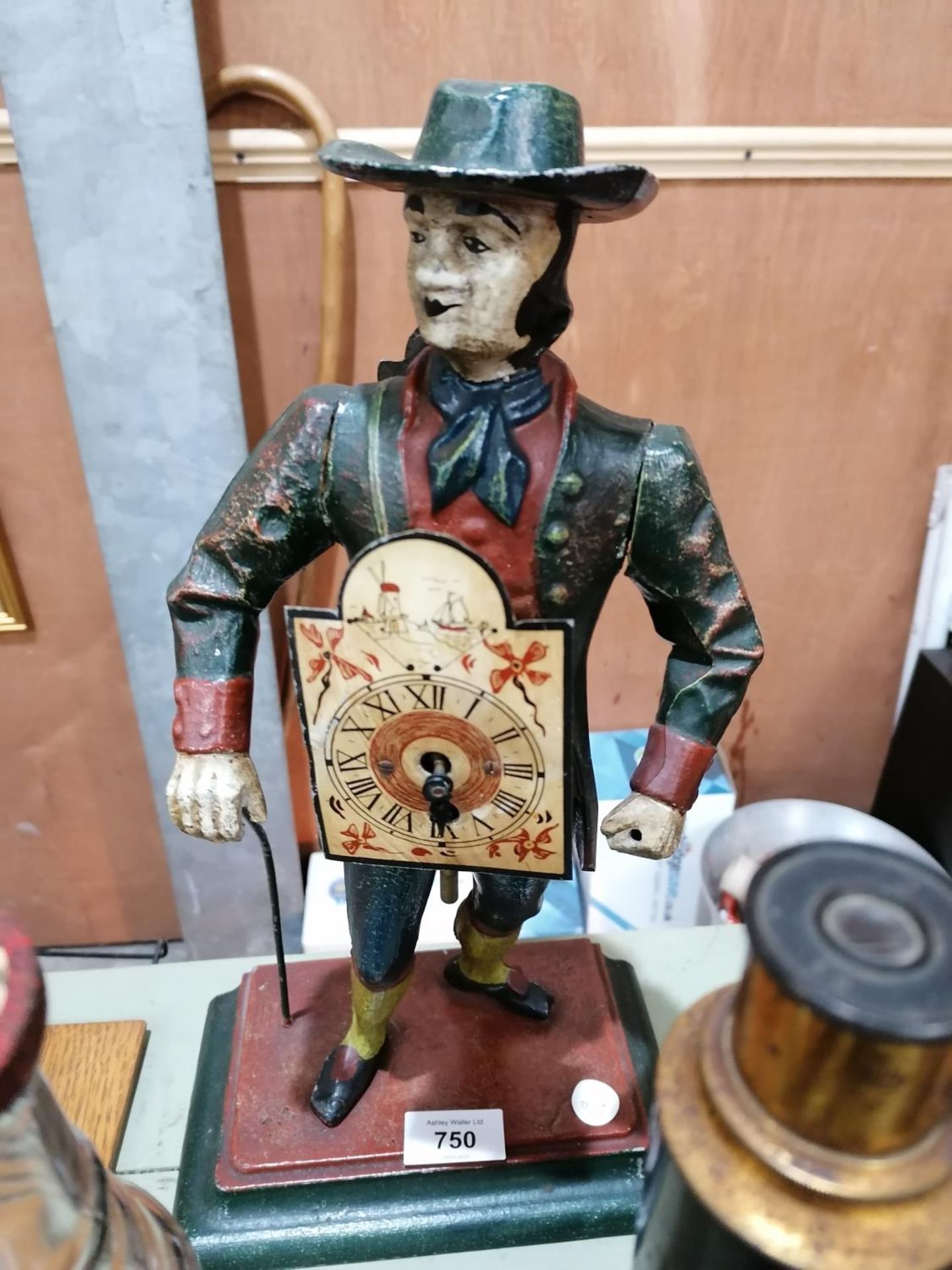 A CAST FIGURAL CLOCK