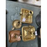 FOUR VINTAGE BRASS CANDLE HOLDERS