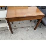 A FOLDING TEAK CARD TABLE