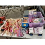 A LARGE COLLECTION OF BARBIE AND OTHER DOLLS TOGETHER WITH CARS, BICYCLES AND OTHER ACCESSORIES