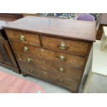 A 19 CENTURY MAHOGANY CHEST OF TWO SHORT AND THREE LONG DRAWERS ON BRACKET FEET