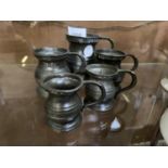A SET OF FIVE VINTAGE PEWTER SMALL TANKARDS