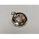 A .925 SILVER LOCKET WITH NUDE LADY DESIGN