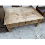 A MEXICAN PINE COFFEE TABLE WITH SINGLE DRAWER