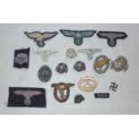 A BAG OF ASSORTED GERMAN BADGES TO INCLUDE WOUND BADGE