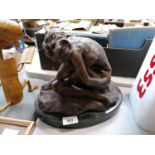 A BRONZE NUDE FIGURE ON A MARBLE BASE