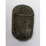 A LAPLAND SHIELD BADGE