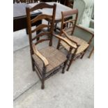 TWO LADDER BACK CARVER DINING CHAIRS WITH RUSH SEATS - ONE OAK, ONE MAHOGANY