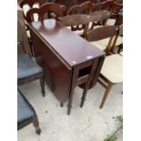 A MAHOGANY DROP LEAF DINING TABLE