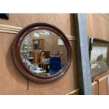 A ORANTE WOODEN CIRCULAR MIRROR