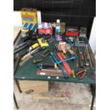 A LARGE COLLECTION OF TOOLS TO INCLUDE SAWS, DRILL BITS, PLIERS, BATTERY CHARGER ETC