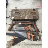 A METAL BOX AND VARIOUS SAWS