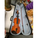 A CASED VIOLIN TOGETHER WITH BOW