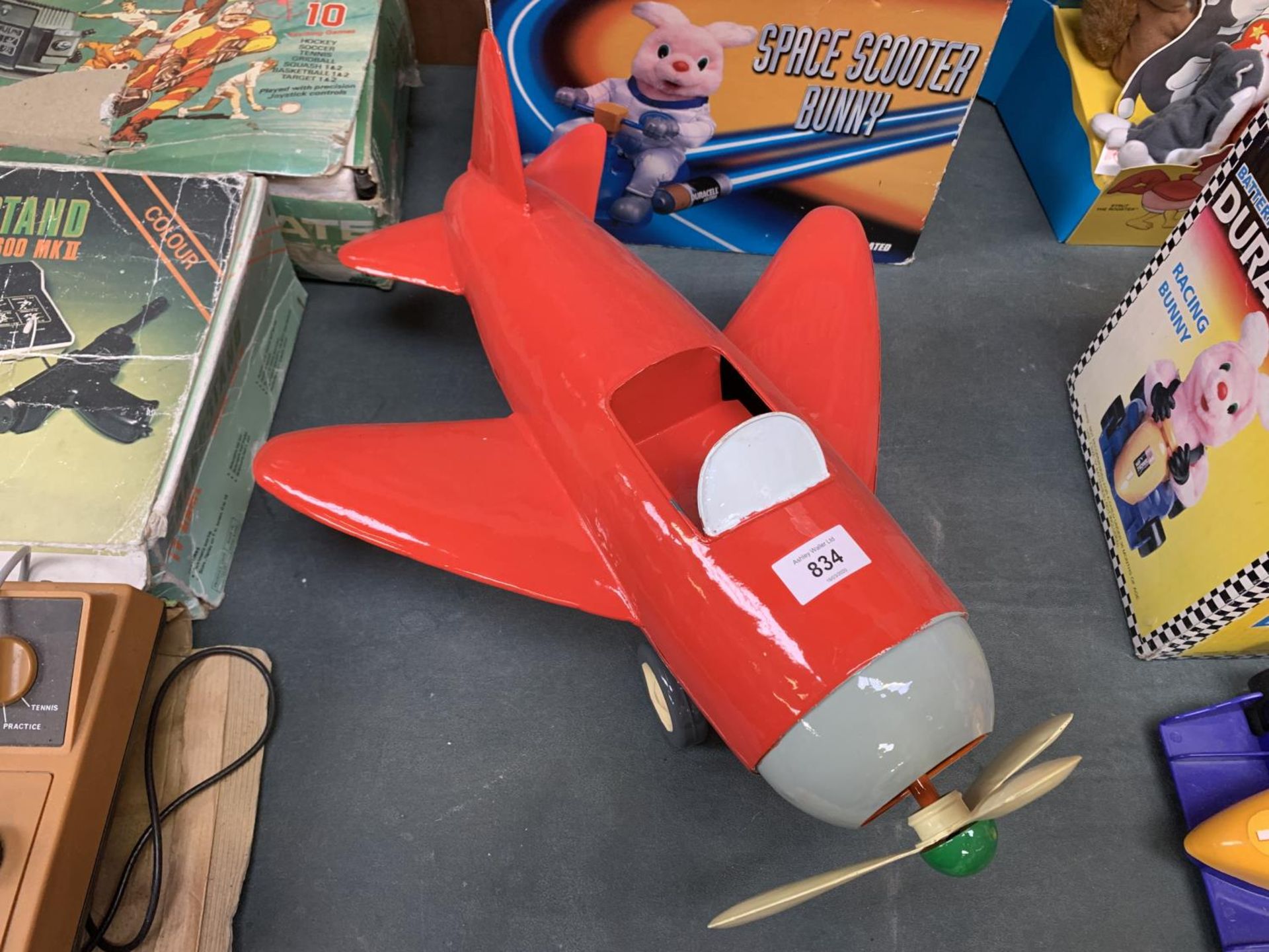 A VINTAGE STYLE TIN PLATE MODEL OF AN AEROPLANE