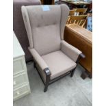 A MAHOGANY WING BACK ARMCHAIR