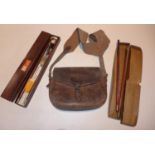 A LEATHER SHOTGUN CARTRIDGE SATCHEL AND TWO GUN CLEANING KITS
