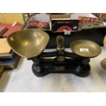 A SET OF VINTAGE BOOTS WEIGHING SCALES