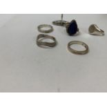 A COLLECTION OF SIX VARIOUS SILVER RINGS
