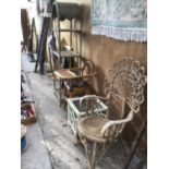 FOUR VARIOUS WICKER ITEMS TO INCLUDE AN ORNATE PEACOCK STYLE BACKED CHAIR, A GLASS TOPPED TABLE,