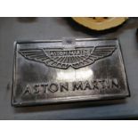 A CHROME ASTON MARTIN SIGN