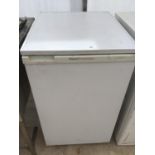 A HOTPOINT FIRST EDITION FRIDGE IN WORKING ORDER BUT IN NEED OF CLEAN
