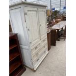 A PAINTED PINE CABINET WITH TWO UPPER DOORS, TWO LONG AND TWO SHORT DRAWERS