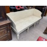 A CARVED WHITE PAINTED THREE SEATER BENCH SEAT