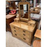 AN ASH DRESSING TABLE WITH TWO LONG AND TWO SHORT DRAWERS, TWO SMALL UPPER DRAWERS AND BEVEL EDGE