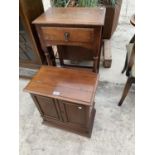 A SMALL MAHOGANY CABINET WITH TWO DOORS AND HINGED TOP AND A SMALL OAK HALL TABLE WITH SINGLE DRAWER