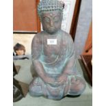 A BRONZE EFFECT HEAVY STONE BUDDHA GARDEN STATUE