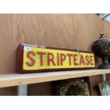 A 'STRIPTEASE' ILLUMINATED LIGHT BOX SIGN